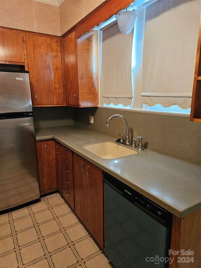 kitchen with appliances with stainless steel finishes and sink