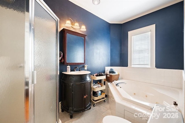 bathroom featuring ornamental molding, tile patterned floors, independent shower and bath, and vanity