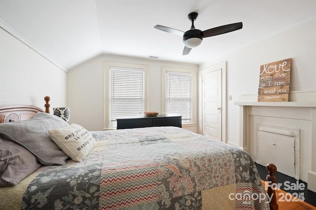 bedroom featuring vaulted ceiling and ceiling fan