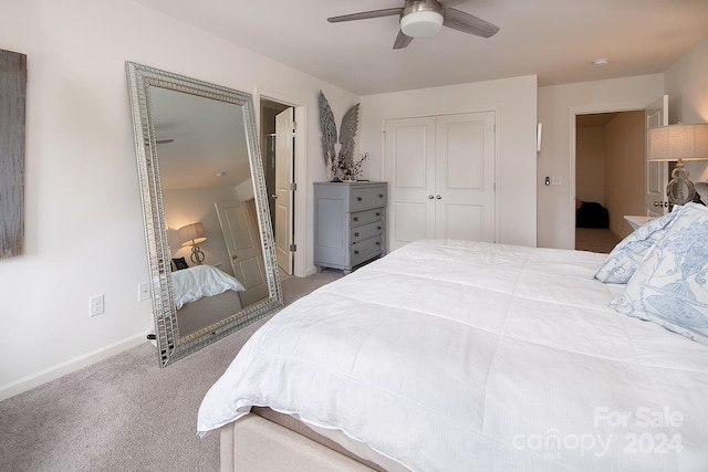 bedroom with carpet flooring, ceiling fan, and a closet