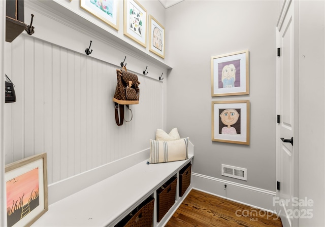 mudroom with dark hardwood / wood-style flooring