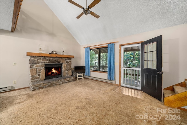 unfurnished living room with high vaulted ceiling, a textured ceiling, ceiling fan, a stone fireplace, and carpet floors