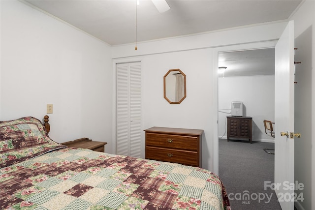 bedroom with ceiling fan, a closet, and carpet floors