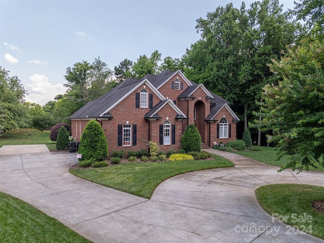 view of front of home with a front yard