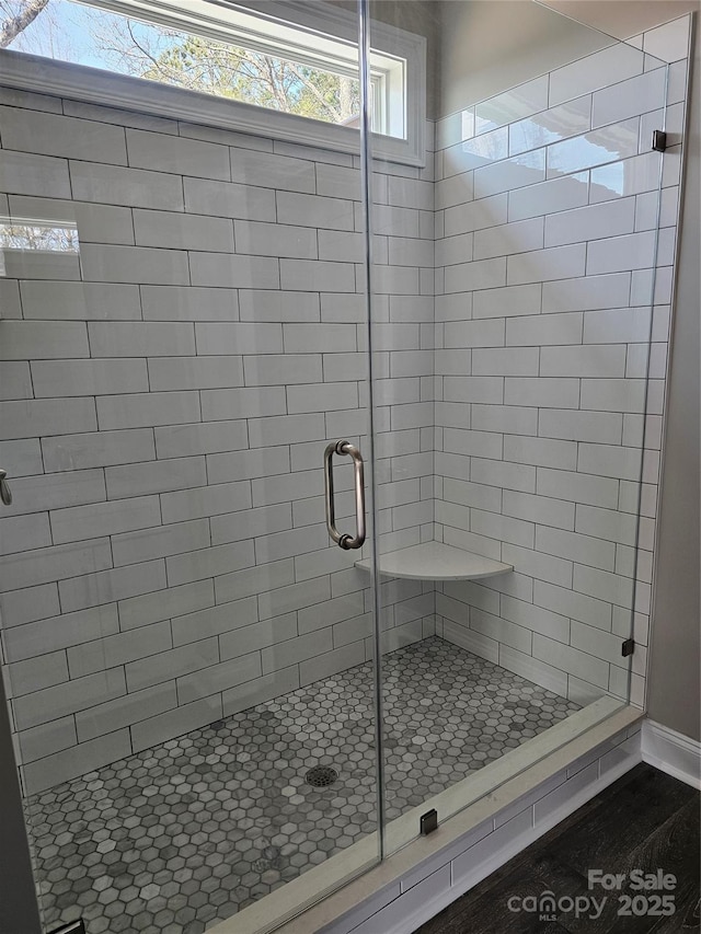 bathroom with an enclosed shower