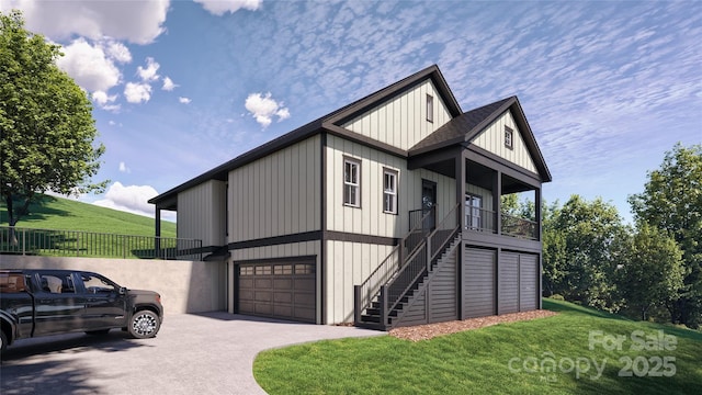 view of front facade featuring a front lawn and a garage