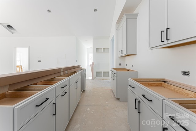 kitchen with white cabinets