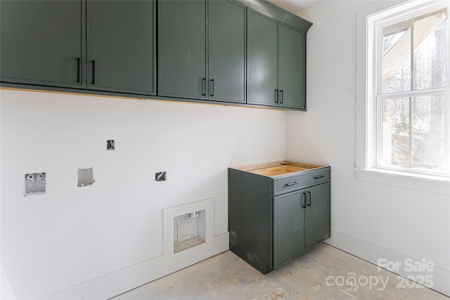 laundry room with cabinets