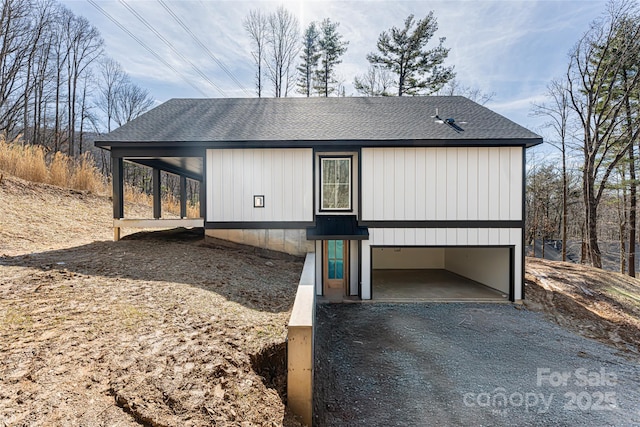 view of front of property with a garage