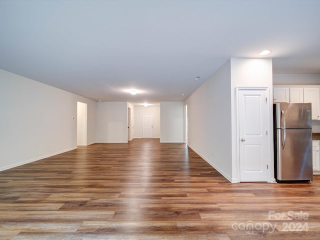 unfurnished room featuring light hardwood / wood-style flooring