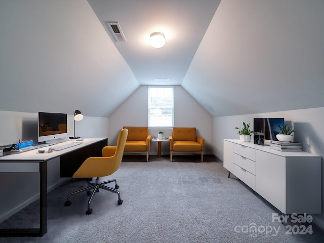 office area with carpet floors and lofted ceiling