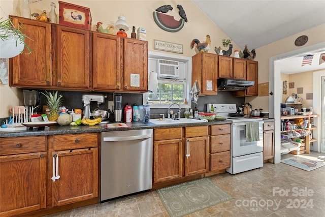 kitchen with dishwasher, vaulted ceiling, a wall mounted air conditioner, sink, and white electric range