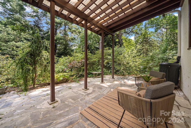 wooden deck with an outdoor living space, a patio, and a pergola