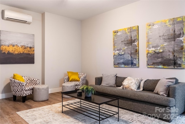 interior space featuring wood-type flooring and a wall unit AC