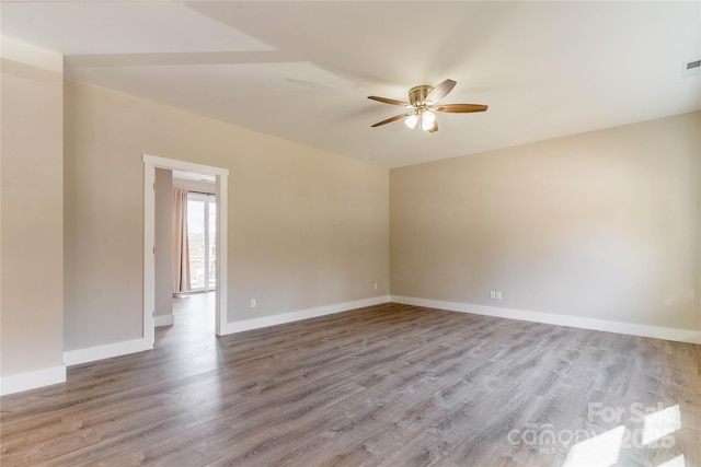 unfurnished room featuring ceiling fan and light hardwood / wood-style floors