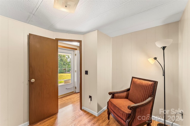 living area featuring light hardwood / wood-style floors