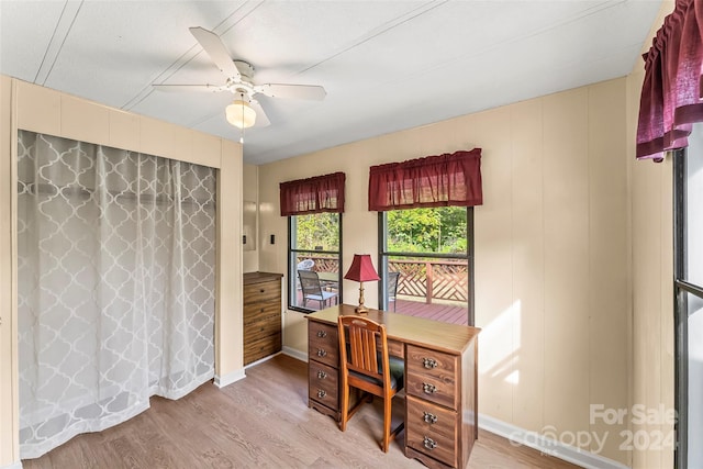 office area with ceiling fan and hardwood / wood-style floors