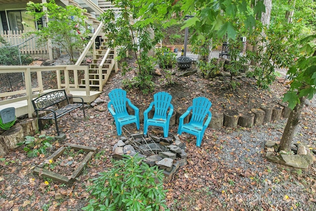 view of yard with an outdoor fire pit