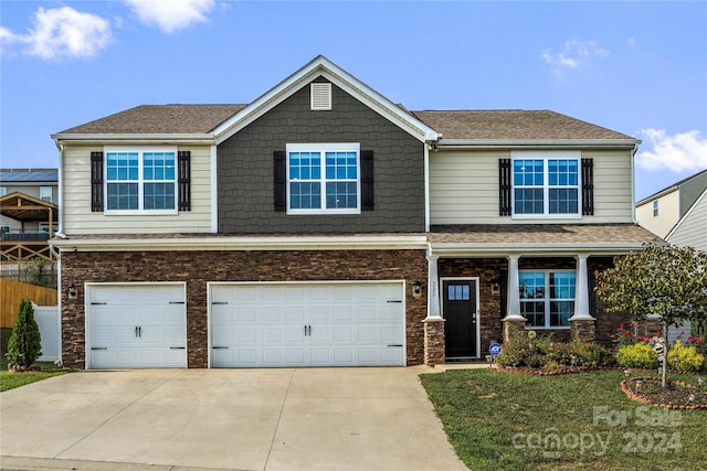 view of front of home featuring a garage