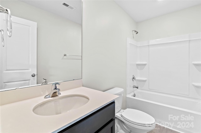 full bathroom with vanity, toilet, and shower / bathing tub combination