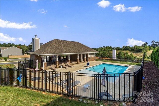 view of pool with a patio area