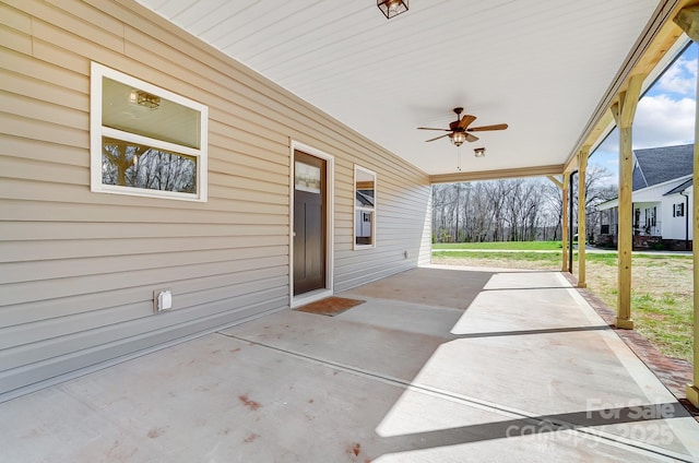 view of patio with ceiling fan