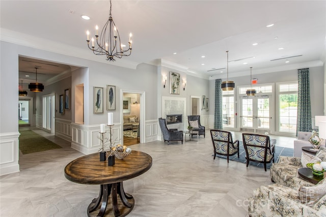 interior space with french doors and ornamental molding