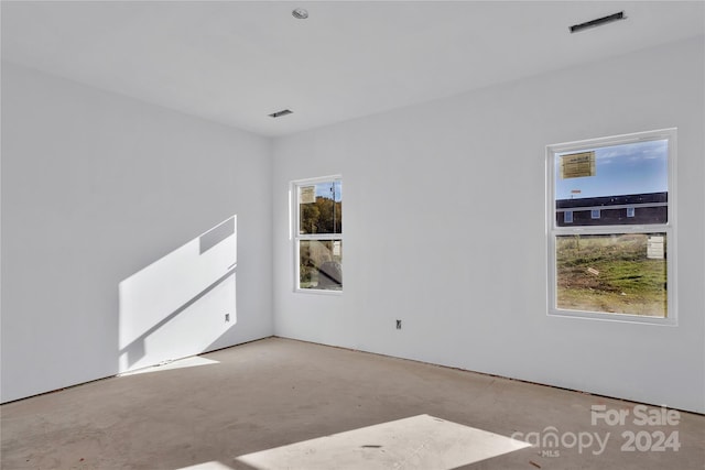 spare room featuring plenty of natural light