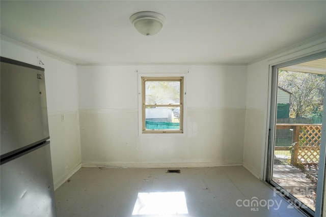 spare room with plenty of natural light