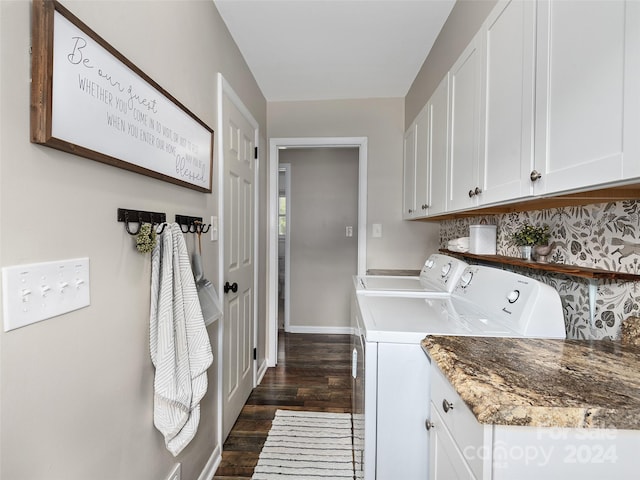 laundry room with cabinets, separate washer and dryer, and dark wood-type flooring