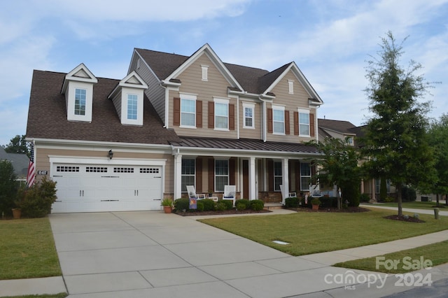 view of front of property with a front lawn and covered porch