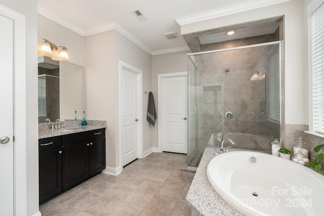 bathroom with vanity, separate shower and tub, ornamental molding, and a wealth of natural light