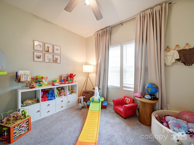 game room featuring carpet flooring, a wealth of natural light, and ceiling fan