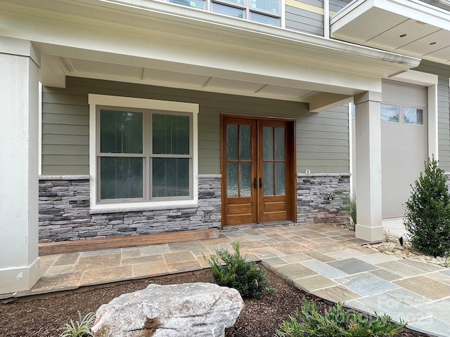 entrance to property featuring french doors