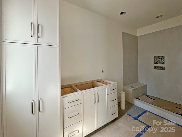 interior space with white cabinetry