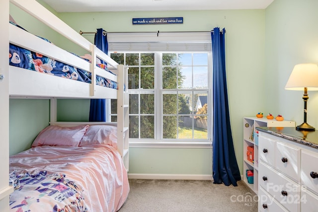 bedroom with light colored carpet