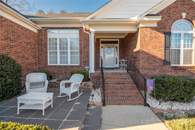 entrance to property featuring a patio