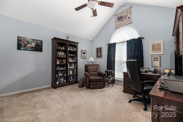 office with ceiling fan, light colored carpet, and high vaulted ceiling