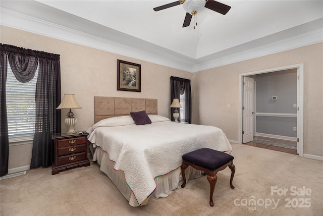 bedroom featuring ceiling fan, light colored carpet, and crown molding