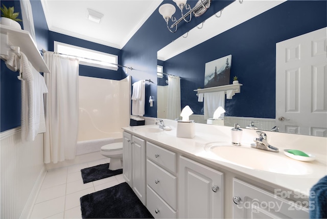 full bathroom with toilet, shower / bath combo with shower curtain, tile patterned flooring, ornamental molding, and vanity