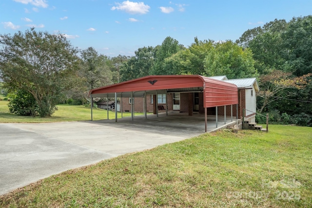 view of vehicle parking featuring a yard and a carport