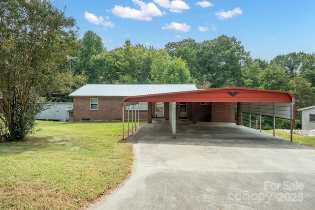 exterior space featuring a carport and driveway