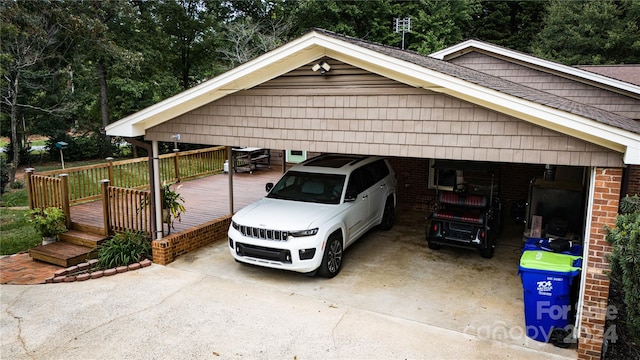 view of front of property featuring a carport and a wooden deck