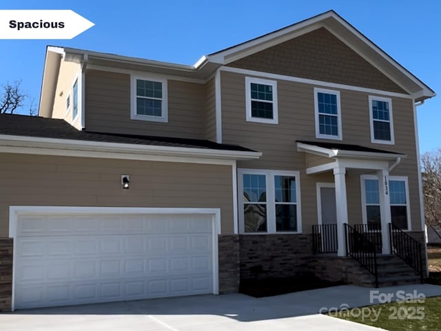 craftsman-style house featuring a garage