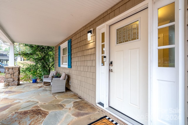 entrance to property with covered porch