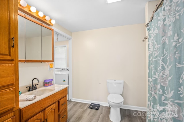 bathroom with vanity, toilet, a shower with shower curtain, and hardwood / wood-style flooring