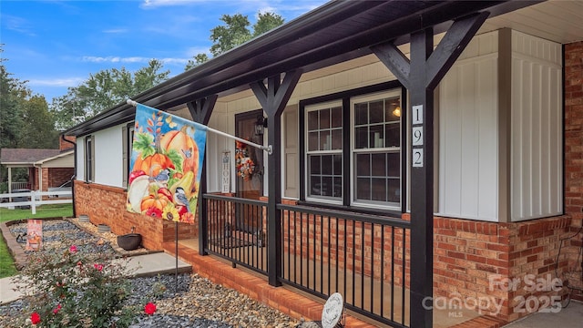 view of home's exterior with covered porch