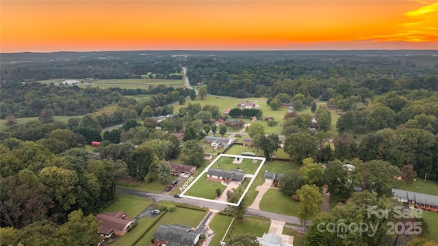 view of aerial view at dusk