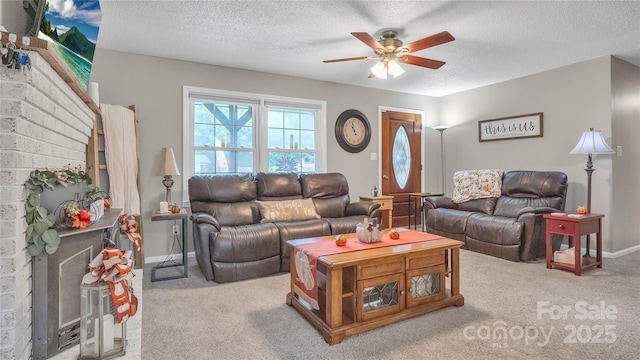 carpeted living room featuring a textured ceiling and ceiling fan