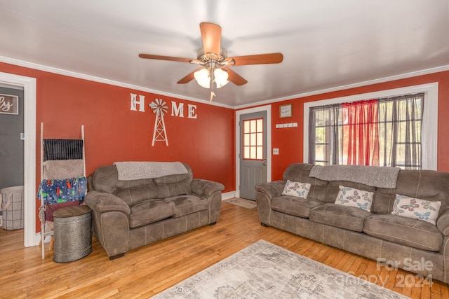 living room featuring ornamental molding, ceiling fan, and hardwood / wood-style flooring